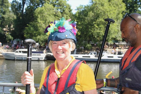 Mary Lumley, York Rotary Club President poses with oar and sea themed hat.