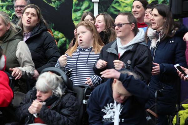 AAM's projects sing and sign together at Asda, Monks Cross