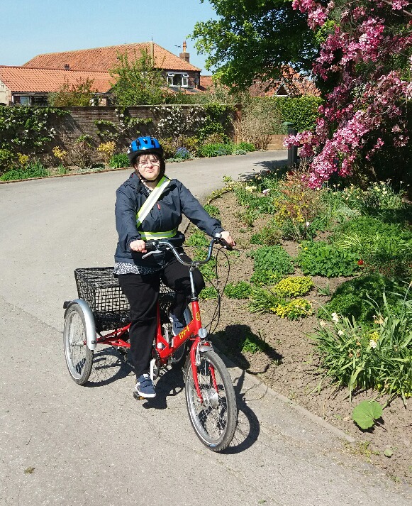 A photograph of one of our participants on her bike during the 2.6 challenge