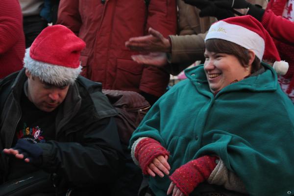 Claire busking alongside other choir members