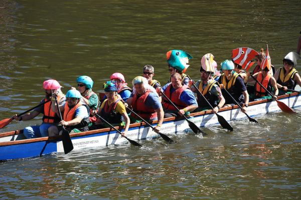 Mary and the rest of the Seas the Day team row in their Dragon Boat