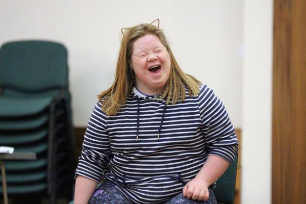 IMPs participant laughs in a weekly session