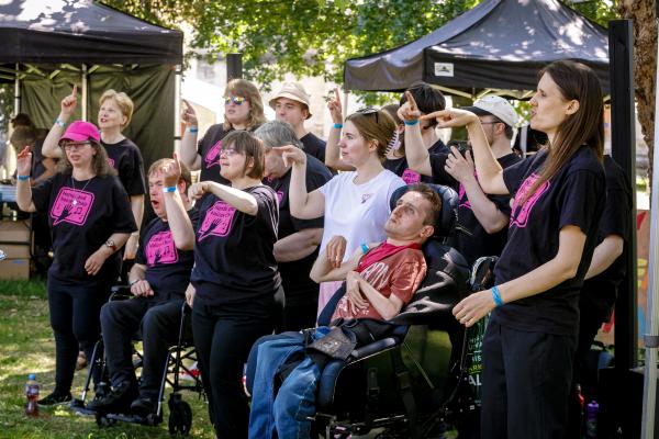 Hands & Voices singing and signing at The Big Tent of Ideas Festival