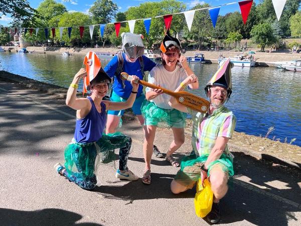 Seas the Day team holding their Tail-enders prize