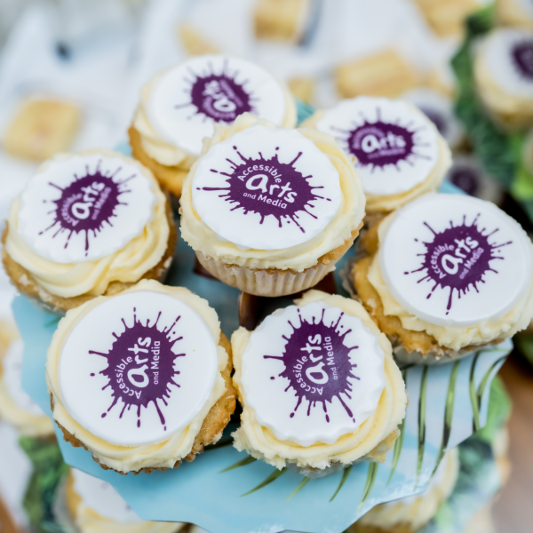 AAM Themed cakes with purple splurges