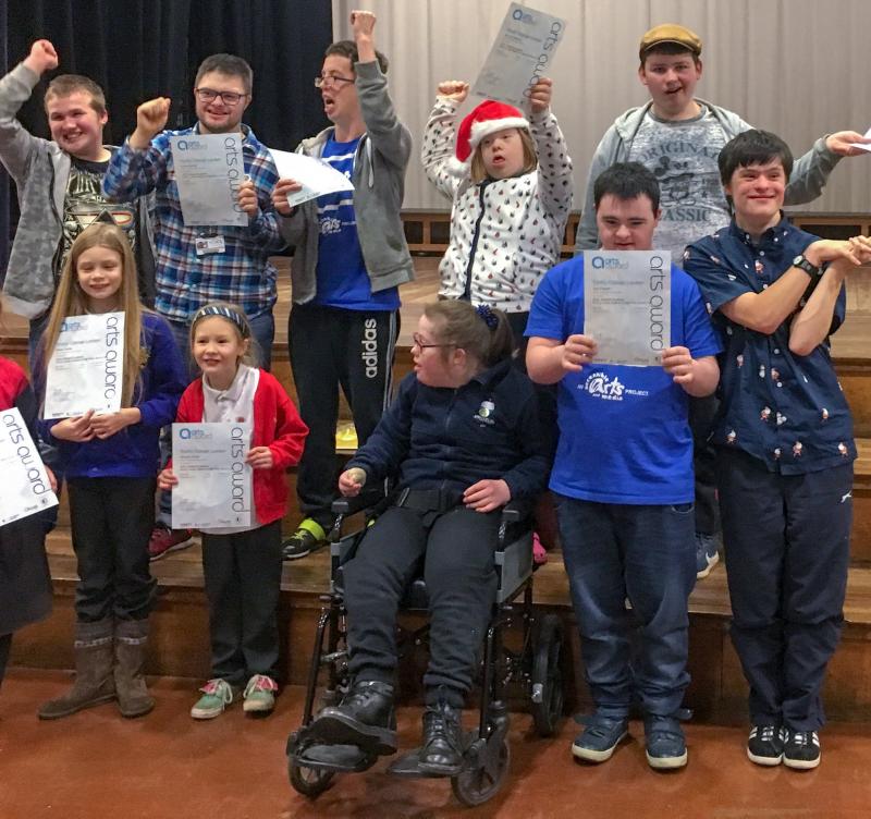 IMPs members with their Arts Award Explore certificates